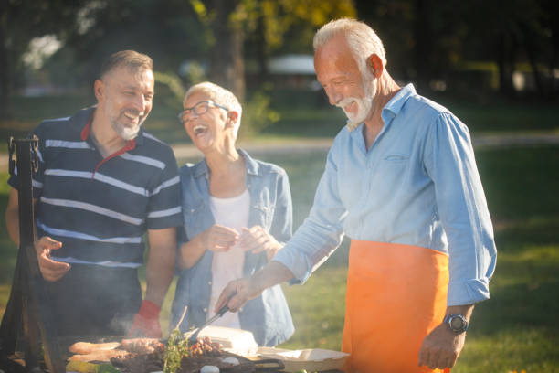 istock Senior people having a picnic 1058741528