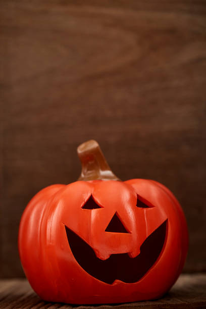 istock Autumn still life with a pumpkin on wooden 1058743904