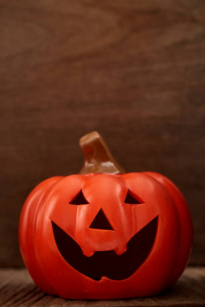 istock Autumn still life with a pumpkin on wooden 1058743920