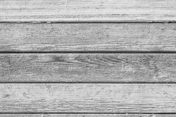 istock Monochrome texture of a board. Abstract background. 1058744320