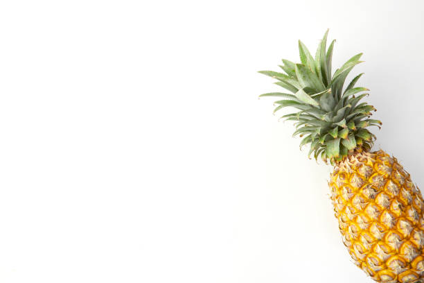 Fresh tropical ripe pineapple fruit isolated on white background