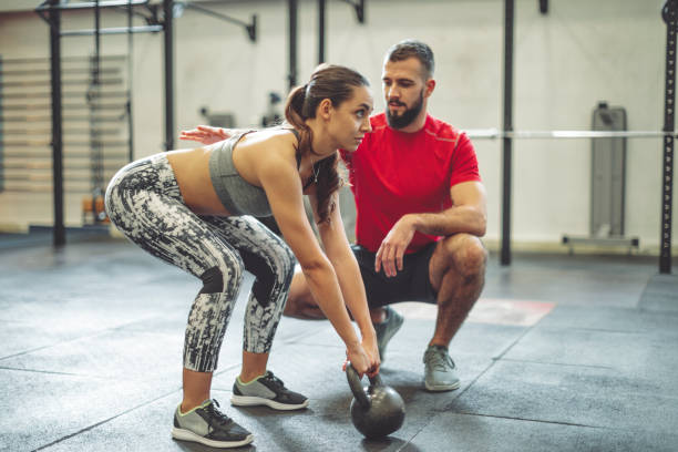 istock Young couple is doing cross training  exercise together 1058747180