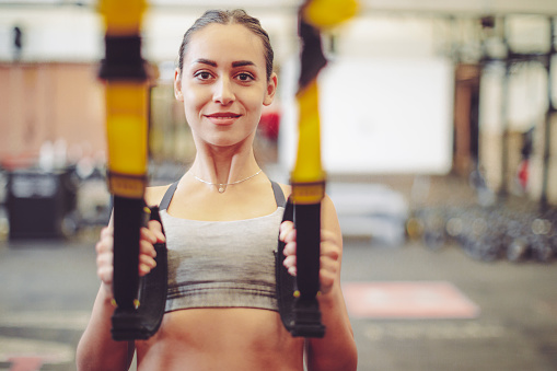 Young woman is doing cross training  exercise