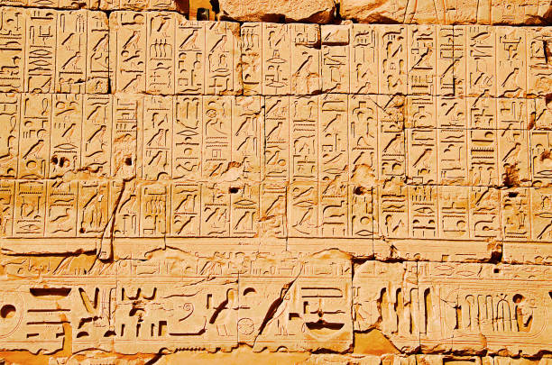 istock Carving details, Inner view of Karnak Temple complex, Comprises a vast mix of decayed temples, chapels, pylons and other buildings, Luxor, Egypt 1058749832