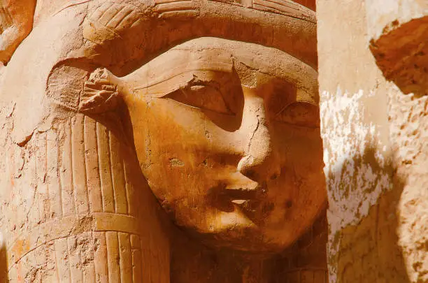 Close up view of an idol of Goddess Hathor, The cow goddess, Situated at the third floor of the Temple of Hatshepsut, Is an ancient funerary shrine, Dedicated to the sun god Amon, Located on the west bank of the Nile river, Near Valley of the Kings, Luxor, Upper Egypt