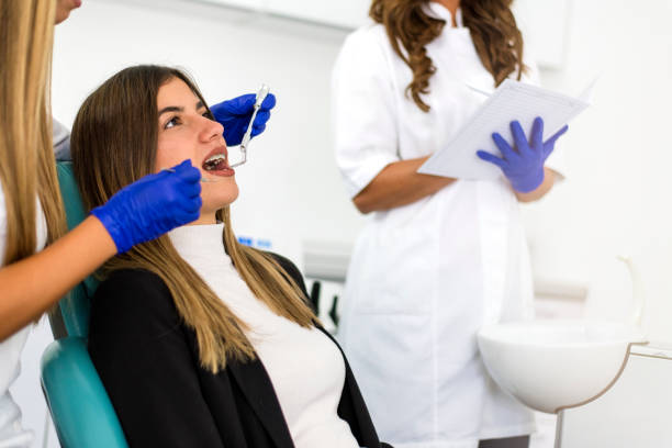 istock Young happy  patient a with orthodontic braces 1058753898