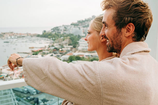 istock couple enjoying together in their bathrobes 1058757170