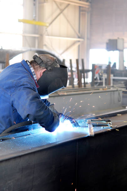 istock welder works in metal construction 1058759282