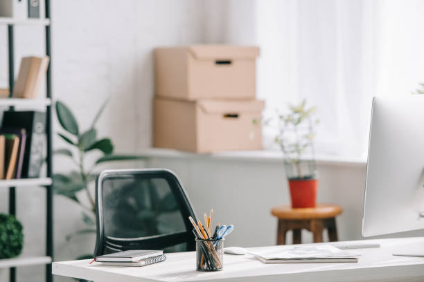 istock office supplies and computer on table in business office 1058759600