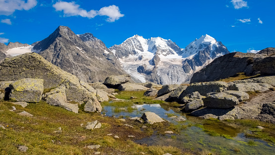 Breathtaking scenery near Fuorcla Surlej (Graubunden, Switzerland), one of the most beautiful places in Engadin with views on the glaciers and Piz Roseg and Piz Bernina