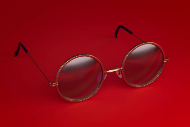 istock 3d rendering Round Sunglasses isolated on red background 1058762220