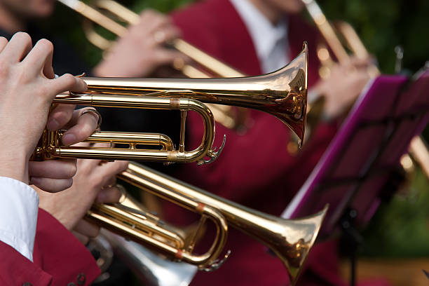 Trumpet Concert Young musicians are playing on trumpet big band jazz stock pictures, royalty-free photos & images