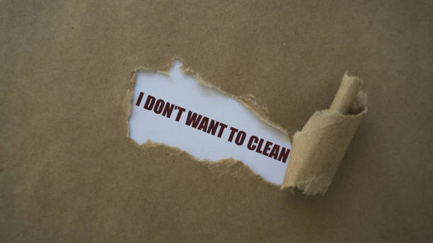 istock i don't want to clean written on torn paper 1058764070