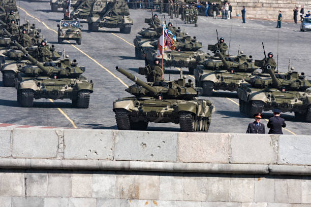 Moscow, Russia - May 5, 2008: Convoy of Russian T-90 tanks in military parade rehearsal on Red Square, Moscow