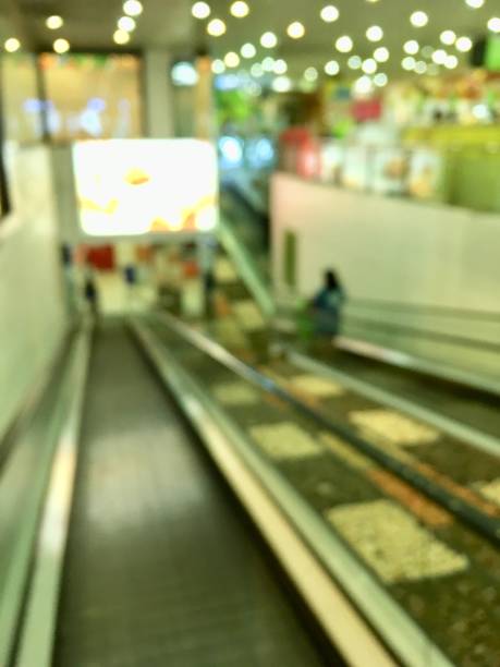 istock blur escalator on department store 1058764864