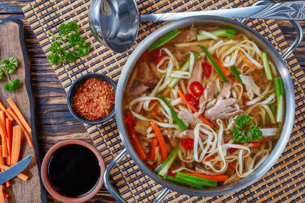 istock duck noodle vegetables soup in a metal casserole 1058767572