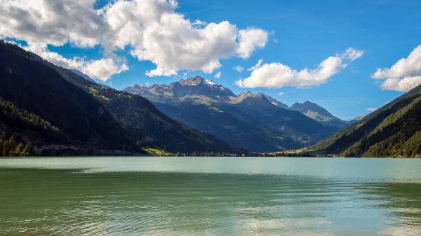 istock View on the lovely Lago di Poschiavo (Graubunden, Switzerland) 1058773102