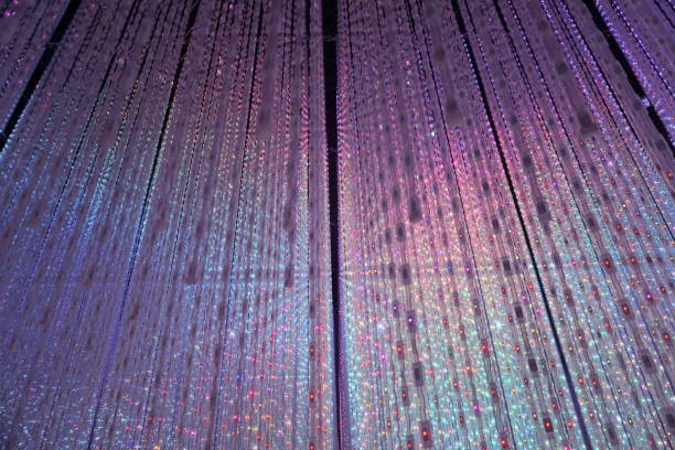 istock curtains from electric garlands. Multicolor cotton christmas garland 1058774094