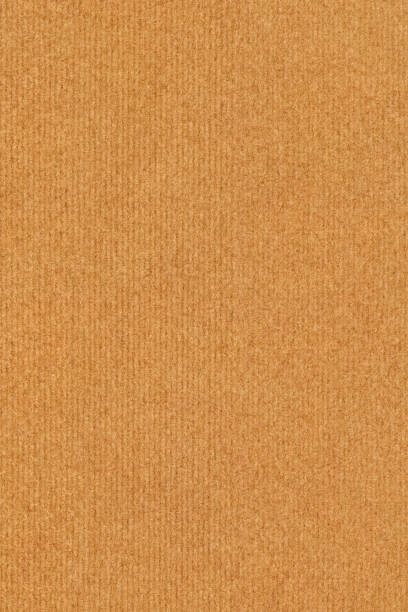 istock Coarse Grain Striped Brown Recycled Manila Kraft Paper Coarse Background Texture Sample 1058776154