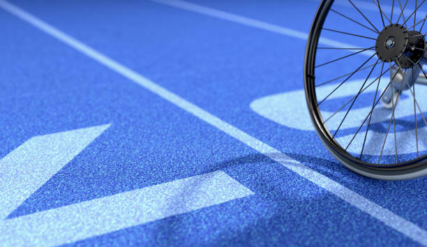 istock Wheelchair On Athletic Track 1058778752