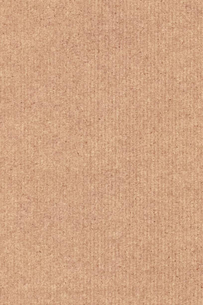 istock Coarse Grain Striped Brown Recycled Manila Kraft Paper Coarse Background Texture Sample 1058781690