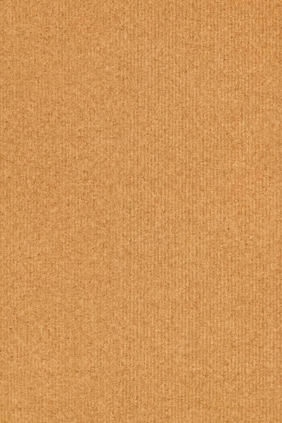 istock Coarse Grain Striped Brown Recycled Manila Kraft Paper Coarse Background Texture Sample 1058785466