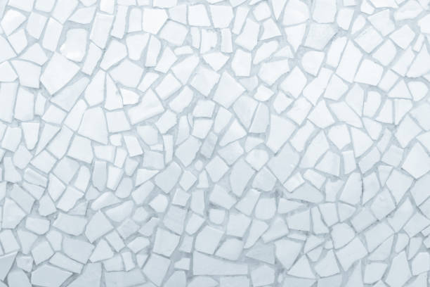 istock Broken tiles mosaic seamless pattern. White and Grey the tile wall high resolution real photo or brick seamless and texture interior background. 1058785832