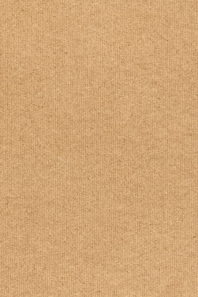 istock Coarse Grain Striped Brown Recycled Manila Kraft Paper Coarse Background Texture Sample 1058787592