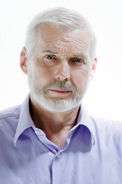 istock senior man frowing serious 105878941