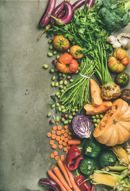 istock Healthy vegetarian Fall food cooking background over concrete table 1058791376