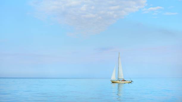istock White yacht sails in the Baltic sea 1058797622