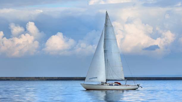 istock White yacht sails in the Baltic sea 1058797630