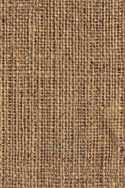 tela di tela burlap marrone naturale grunge a grana grossa trama di sfondo - sandbag burlap sack burlap sack foto e immagini stock