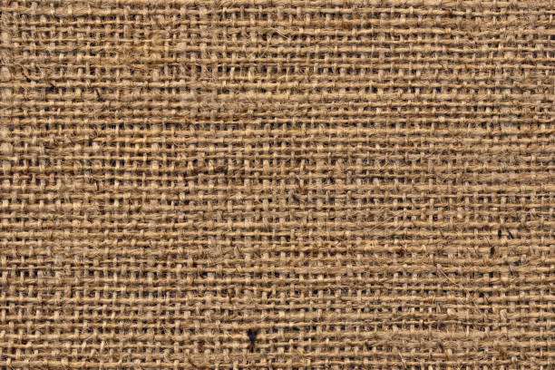 tela di tela burlap marrone naturale grunge a grana grossa trama di sfondo - sandbag burlap sack burlap sack foto e immagini stock