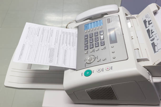 istock The fax machine for Sending documents in the office 1058803932