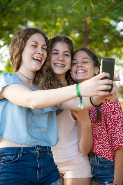 istock Group of friends taking a selfie 1058805724
