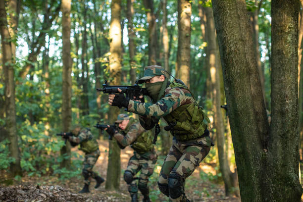 istock Armed Soldiers Having Military training 1058805888