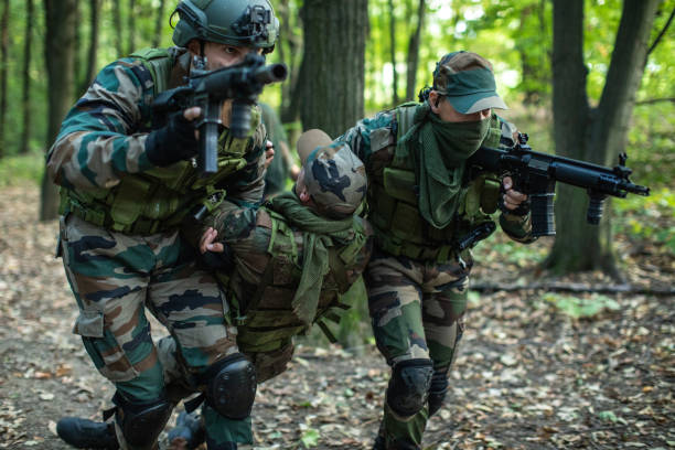 istock Special Army Unit Helping Injured Soldier 1058806104