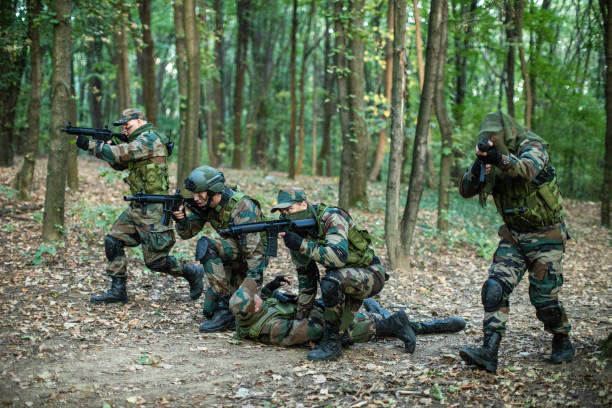istock Special Army Unit Helping Injured Soldier 1058806266