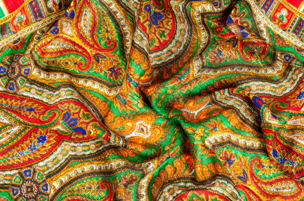 istock Texture, background, pattern. Woman's headscarf, shawl. Bright colors. Paisley. Indian themes. Fabric for clothes Fabric 100% silk. One Fashion Soft Women's Shawl Red Georgette Female Swarf 1058806494