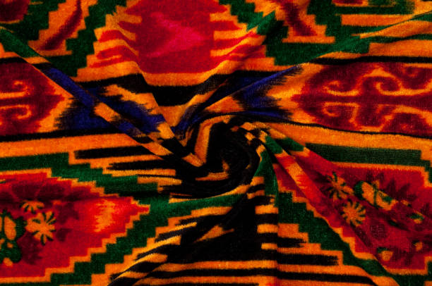 istock Texture, background, pattern. Cloth Uzbek motifs. Indian fabric. Maly rug for Muslims 1058806800