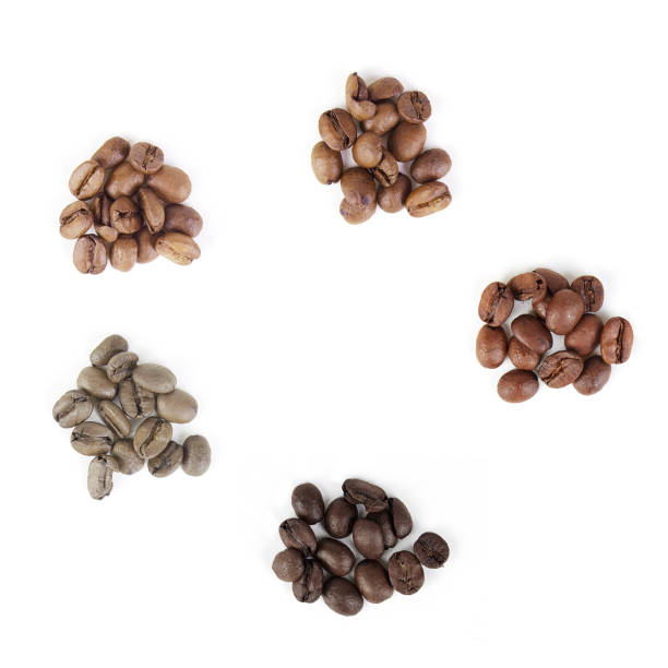 fasi di tostatura del caffè - coffee crop bean seed directly above foto e immagini stock