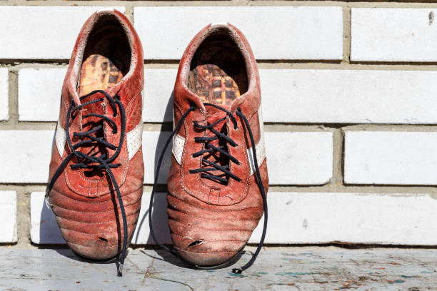 istock old dirty men's sneakers 1058815232