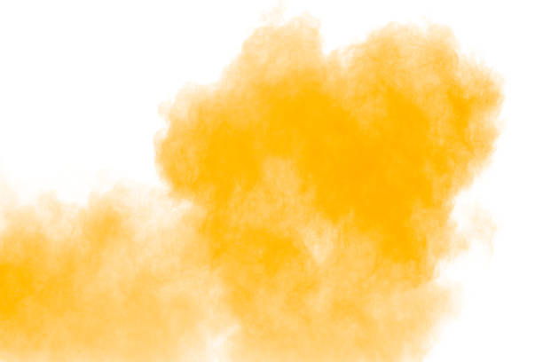 istock abstract yellow dust explosion on  white background. abstract yellow powder splatter on white background. Freeze motion of yellow powder splash. 1058828128