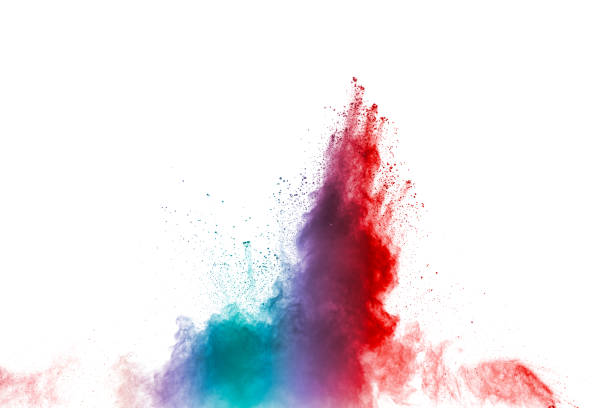 istock Abstract multi color powder explosion on white background.  Freeze motion of  dust  particles splashing. Painted Holi in festival. 1058828150