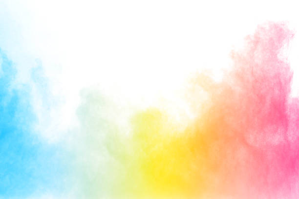 istock Abstract multi color powder explosion on white background.  Freeze motion of  dust  particles splashing. Painted Holi in festival. 1058828228