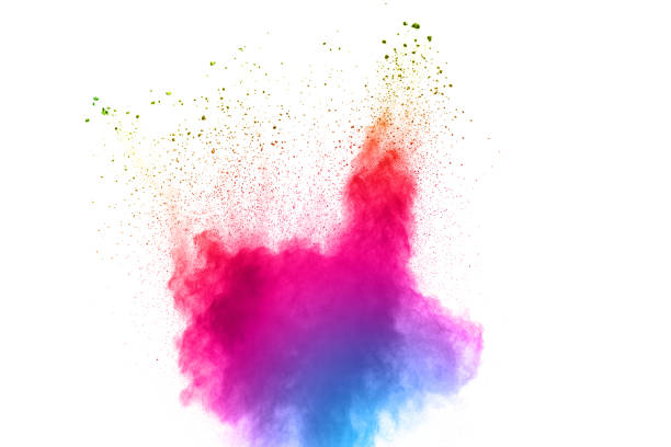 istock Abstract multi color powder explosion on white background.  Freeze motion of  dust  particles splashing. Painted Holi in festival. 1058828236