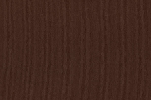 istock Dark Brown Striped Pastel Paper Coarse Grain Background Texture Sample 1058832670