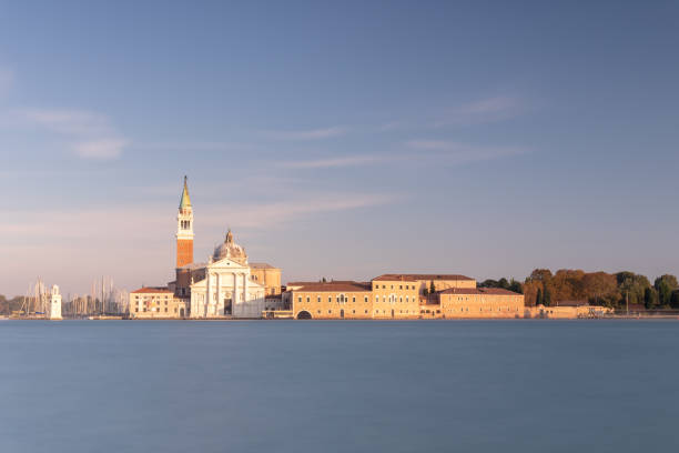 istock Old Venice Customs With Church At Sunset, Italy 1058833012