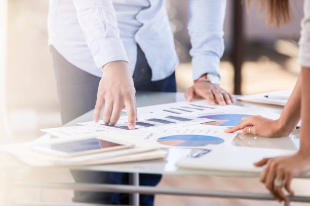 istock Anonymous male and female discuss financial plans 1058833024
